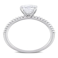 Zaručnički prsten od bijelog zlata od 14 karata s bijelim safirom i dijamantom M. A., koji je izradila tvrtka M. A. A.